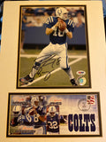 2005 Peyton Manning autographed photo and FDC display.